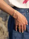 bracelet-twistband-cacatoes-rose_adf23d06-b3f0-41e1-b334-71b2b0d16abc.webp
