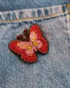 BROCHE TISSÉE PAPILLON ROSE 